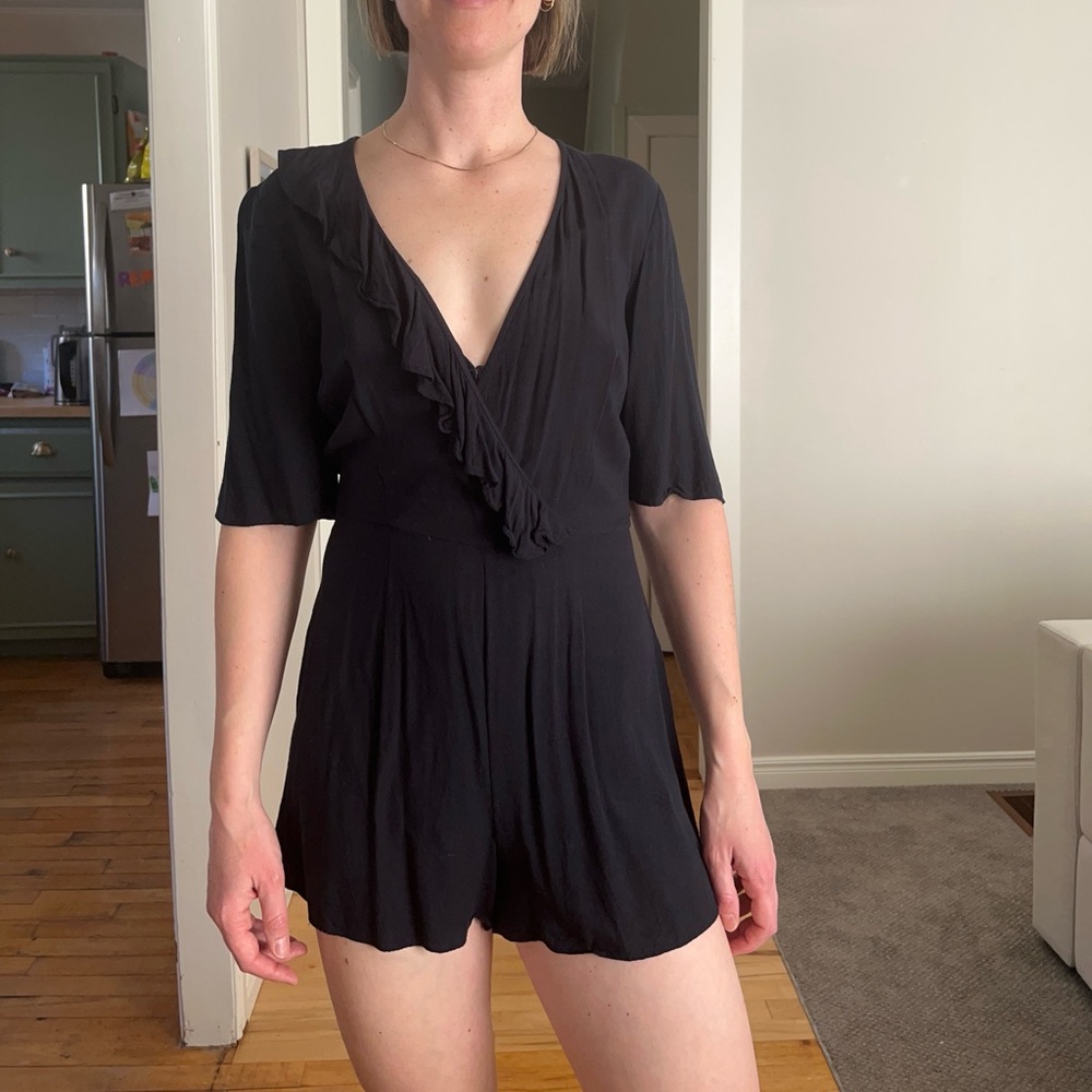 Navy V-Neck Romper with Ruffled Edge